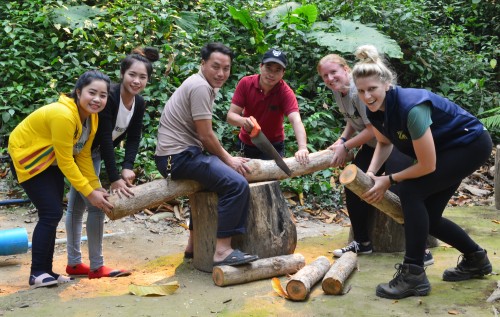 Amy with some of the Keepers making enrichment for the bears 