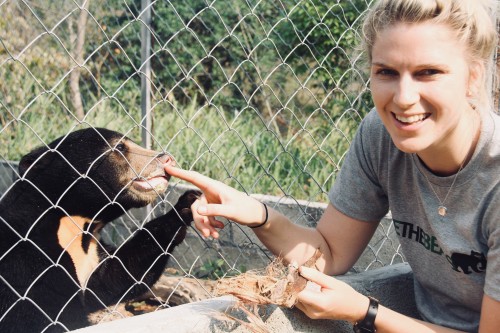 Amy with Mary the Sun Bear